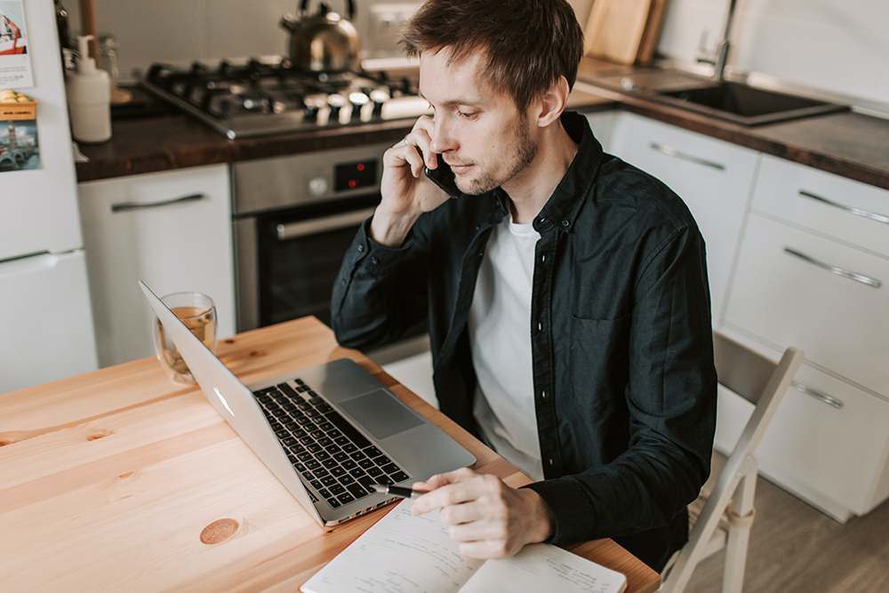 image of man on phone