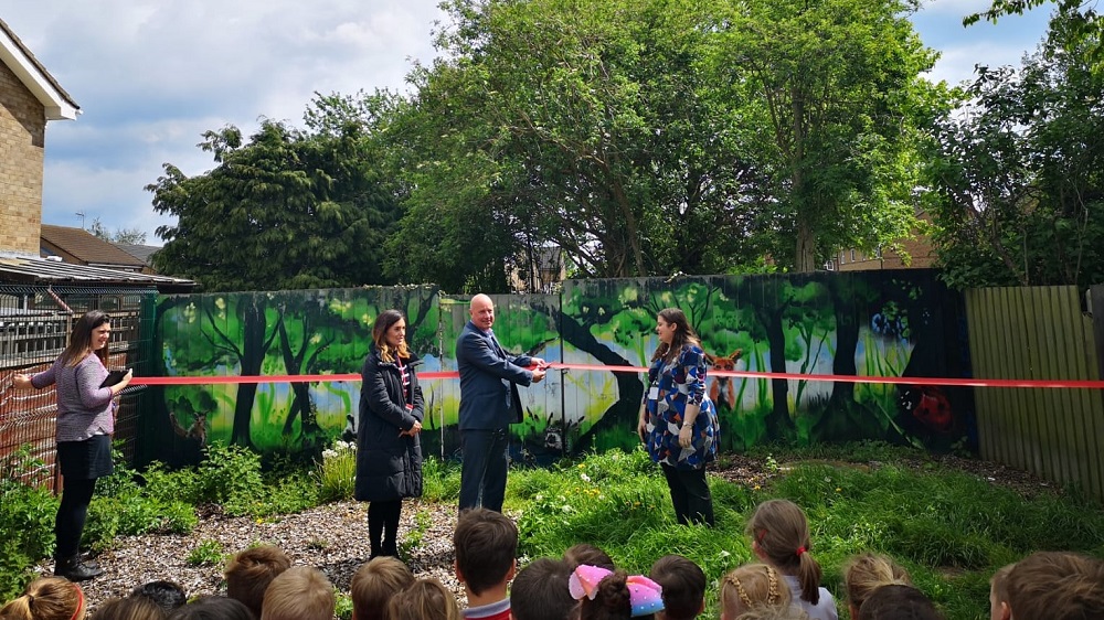 Photo shows Ciaran Kelly opening the nature hotel